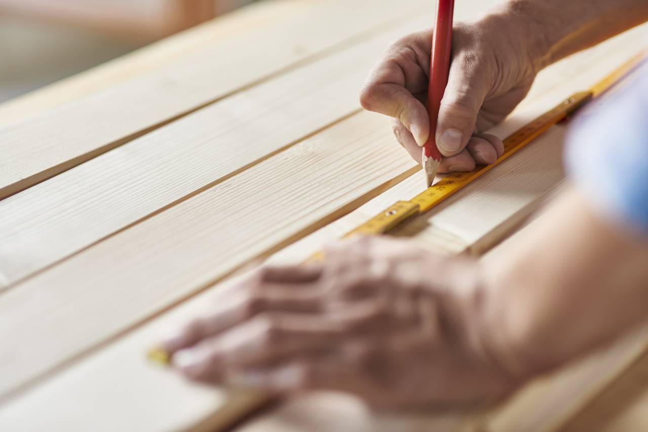 Preparation of wooden planks by carpenter