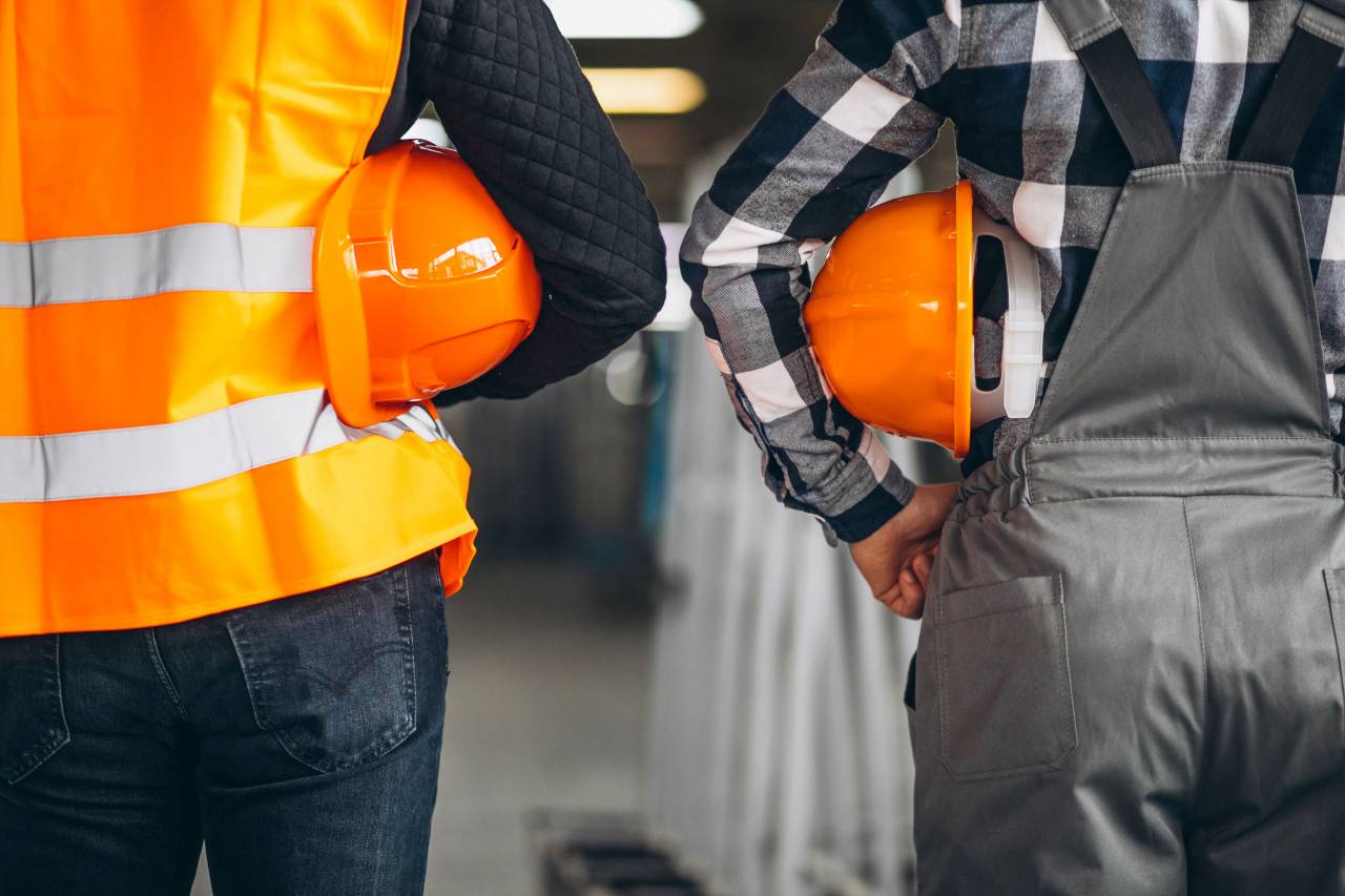 Two colleagues at factory